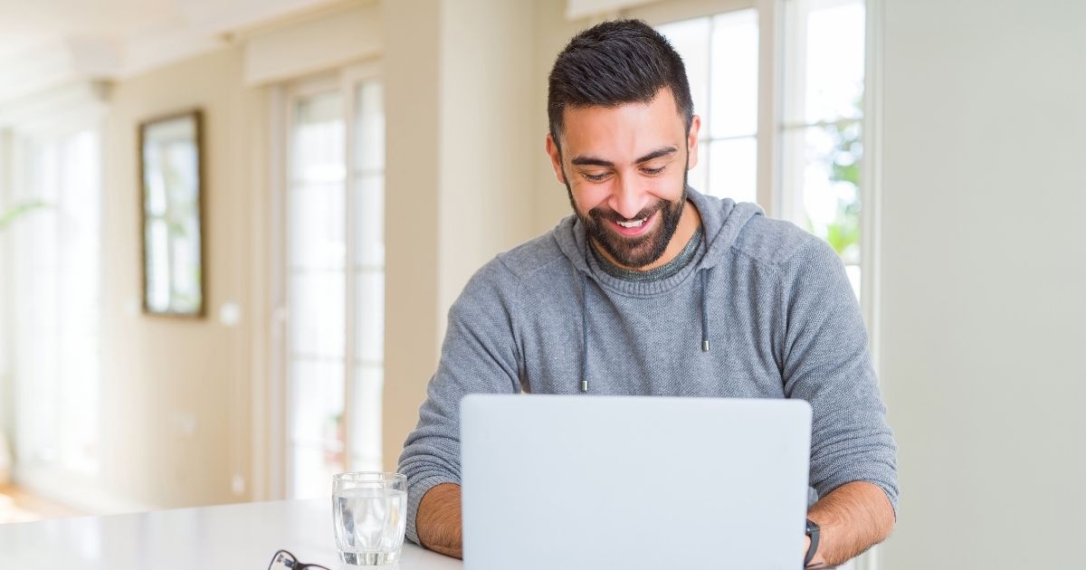Business owner calculating the cost of refinancing a commercial property loan