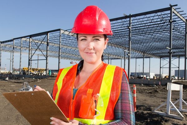 Australian business owner on the site of their own commercial premises under construction