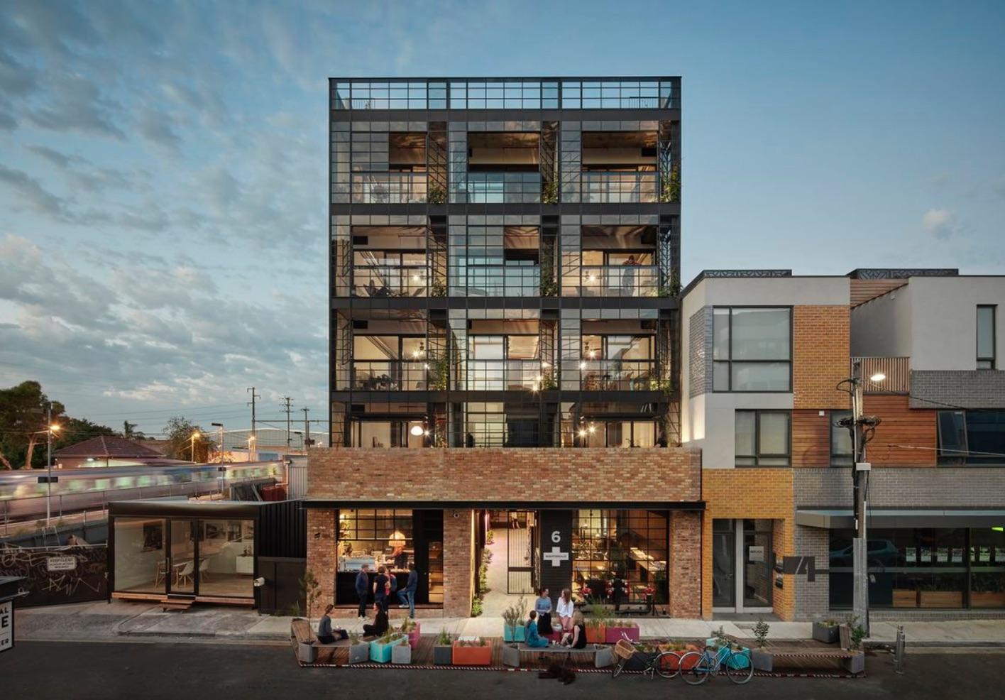 Mixed-use building with retail and residential space financed by Smart Business Plans